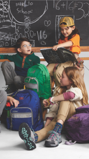 Group of kids with school packs.